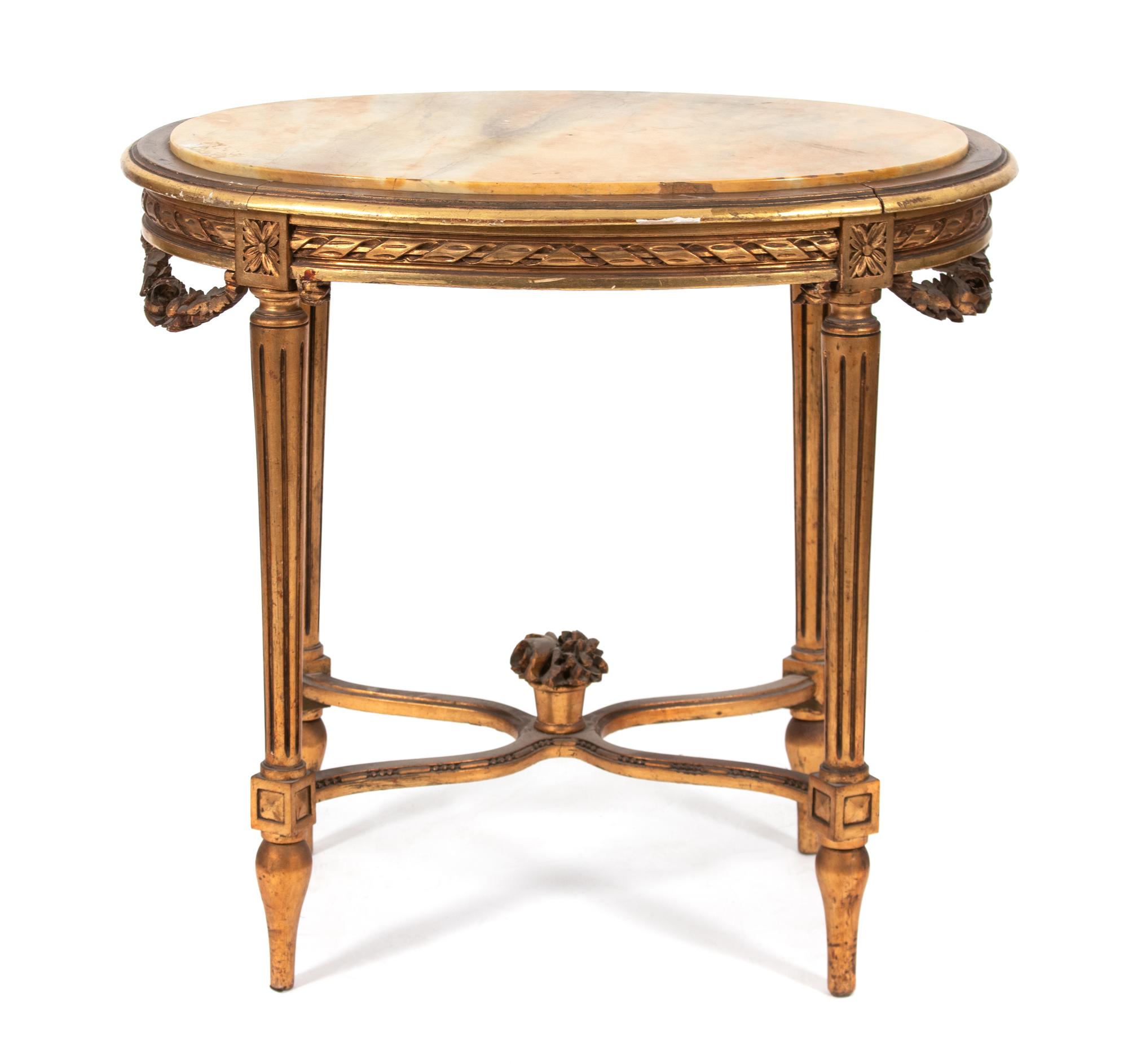 A Louis XVI Style Giltwood and Marble Top Oval Table