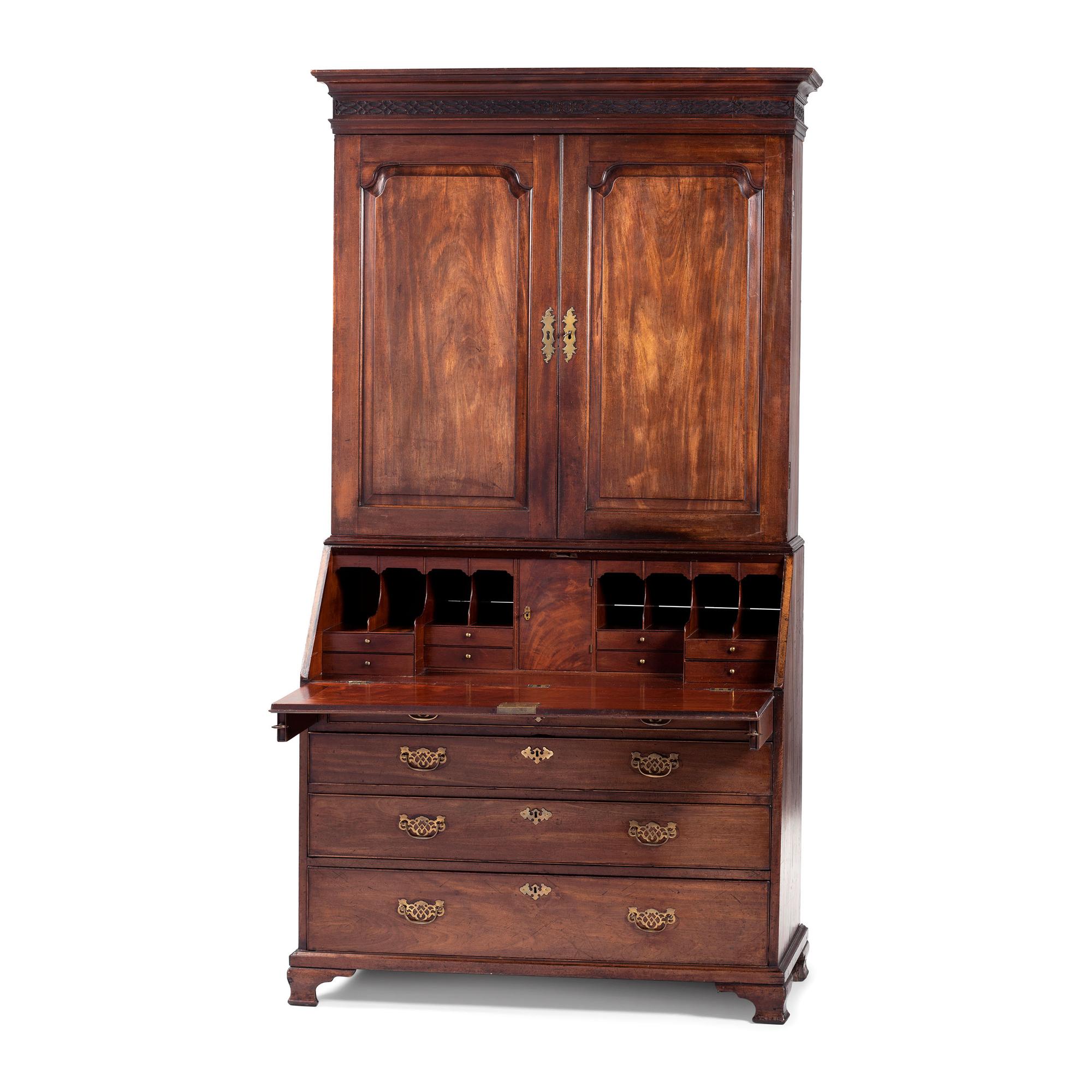 A George III Carved and Paneled Mahogany Secretary Bookcase