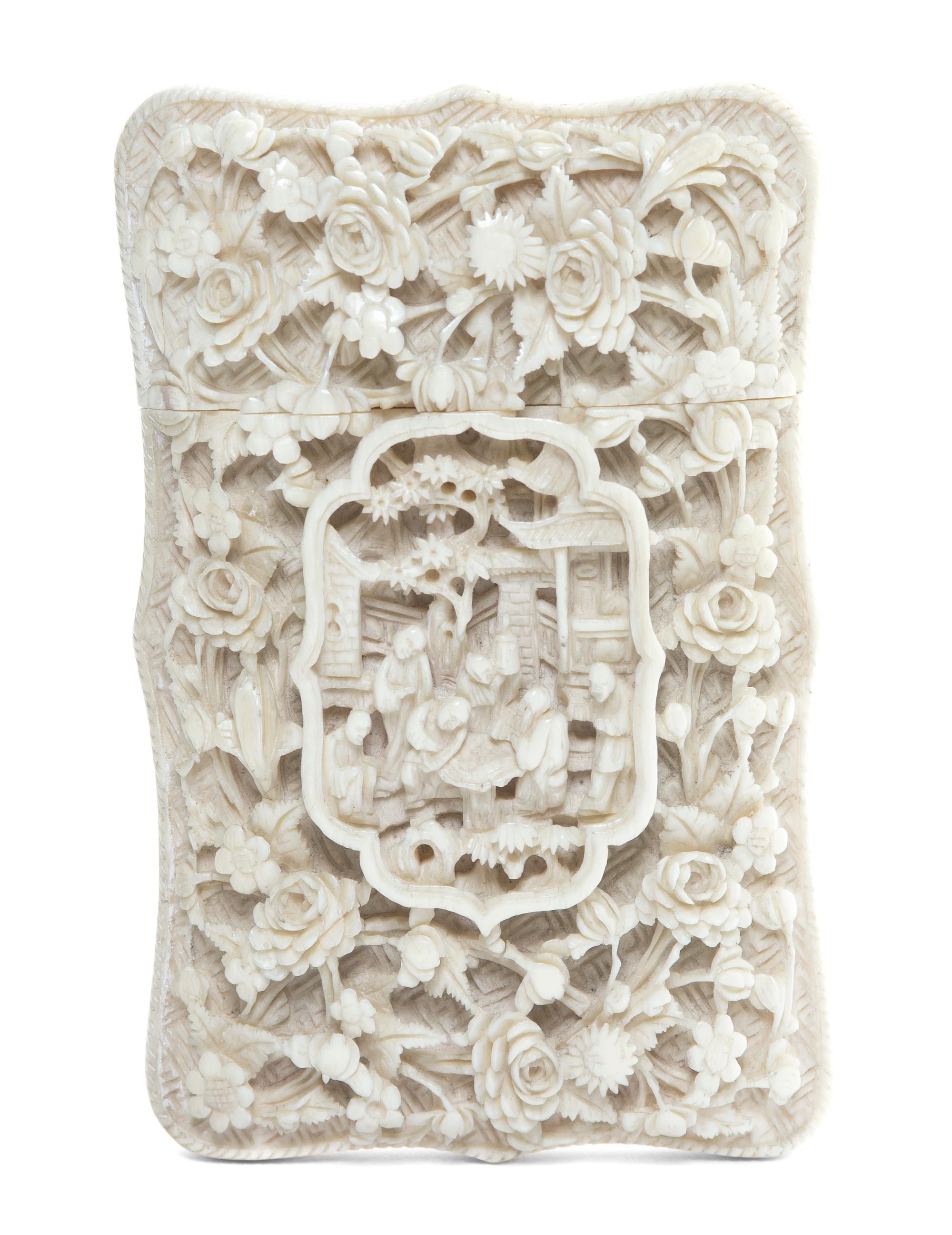 A Chinese Carved Ivory Card Case, Height 4 1/2 inches.