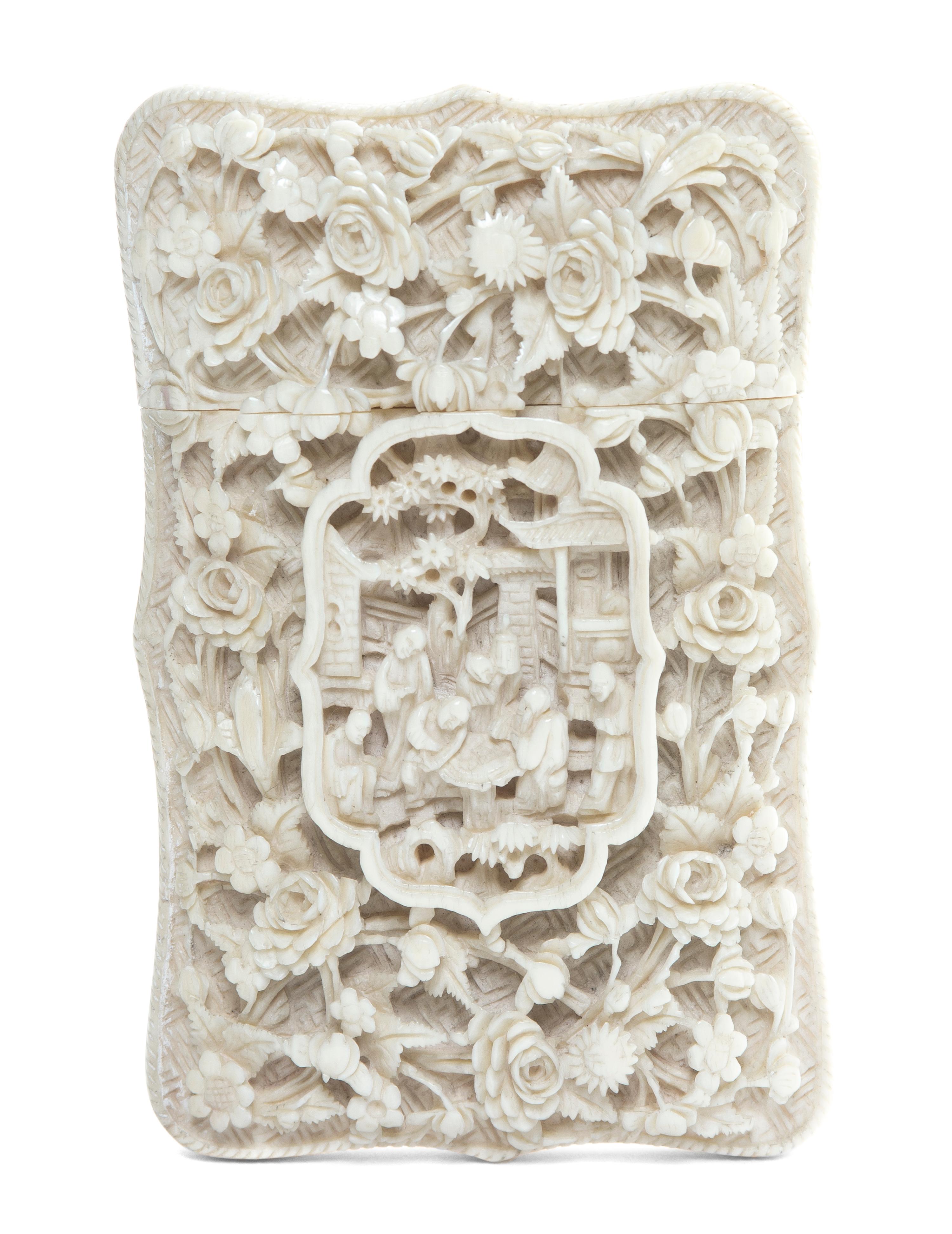 A Chinese Carved Ivory Card Case, Height 4 1/2 inches.