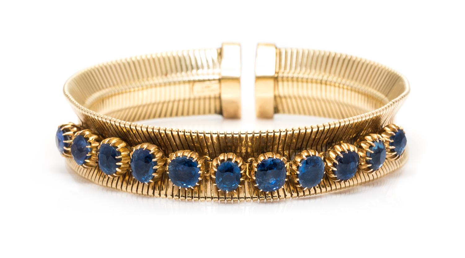 A Retro Yellow Gold and Sapphire Cuff Bracelet, Forstner, 24.00 dwts.