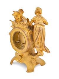 A Louis XV Style Gilt Metal Figural Clock with German Movement