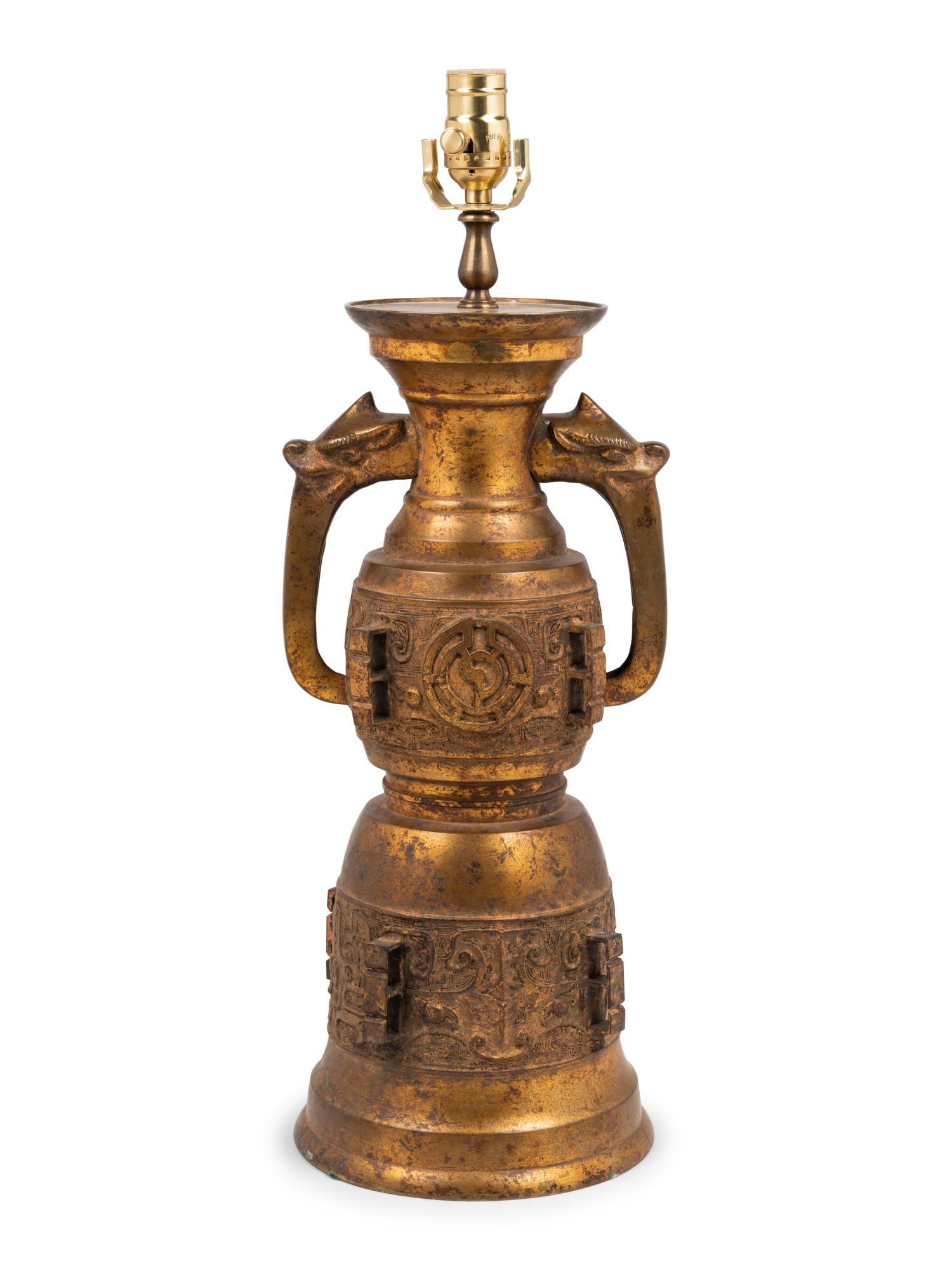 A Chinese Archaic Style Gilt Metal Lamp in the Manner of James Mont