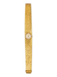 UNIVERSAL GENÈVE, 18K YELLOW GOLD WATCH