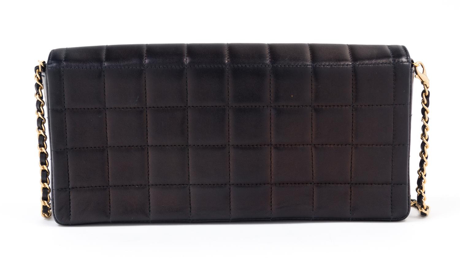A Chanel Black Lambskin Chocolate Bar Flap Handbag, 10.5" x 5.5" x 1.5"; Strap drop: 12".