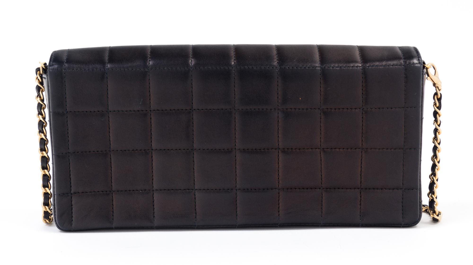 A Chanel Black Lambskin Chocolate Bar Flap Handbag, 10.5" x 5.5" x 1.5"; Strap drop: 12".