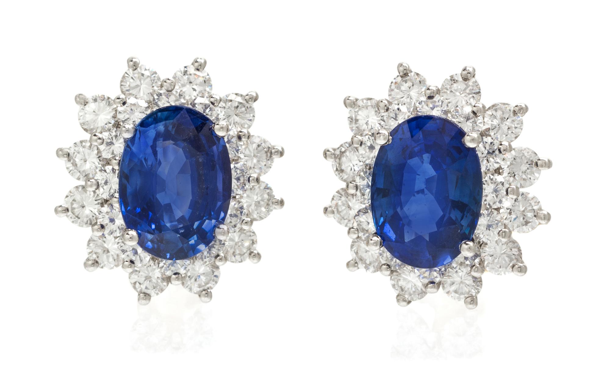 A Pair of Platinum, 18 Karat Yellow Gold, Sapphire and Diamond Earclips, 7.00 dwts.