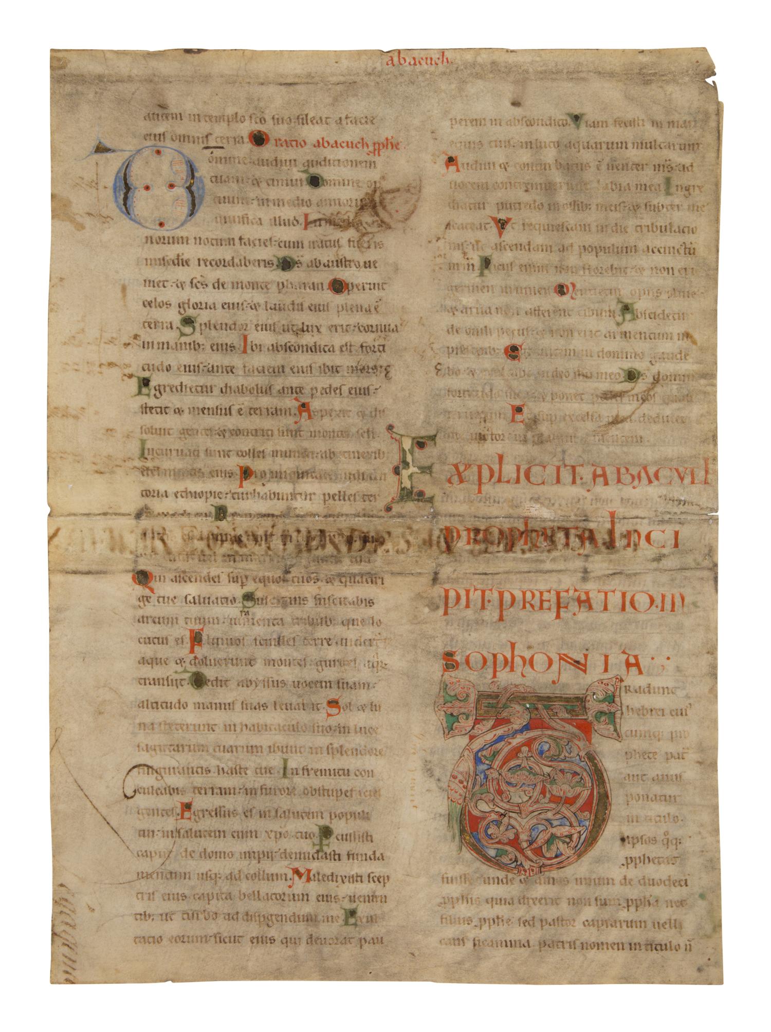 MOSAN ILLUMINATOR(?) Single leaf with decorated Initial ‘T’ from a Lectern Bible, in Latin, illuminated manuscript on parchment [The Netherlands, Mosan? c. 1150]