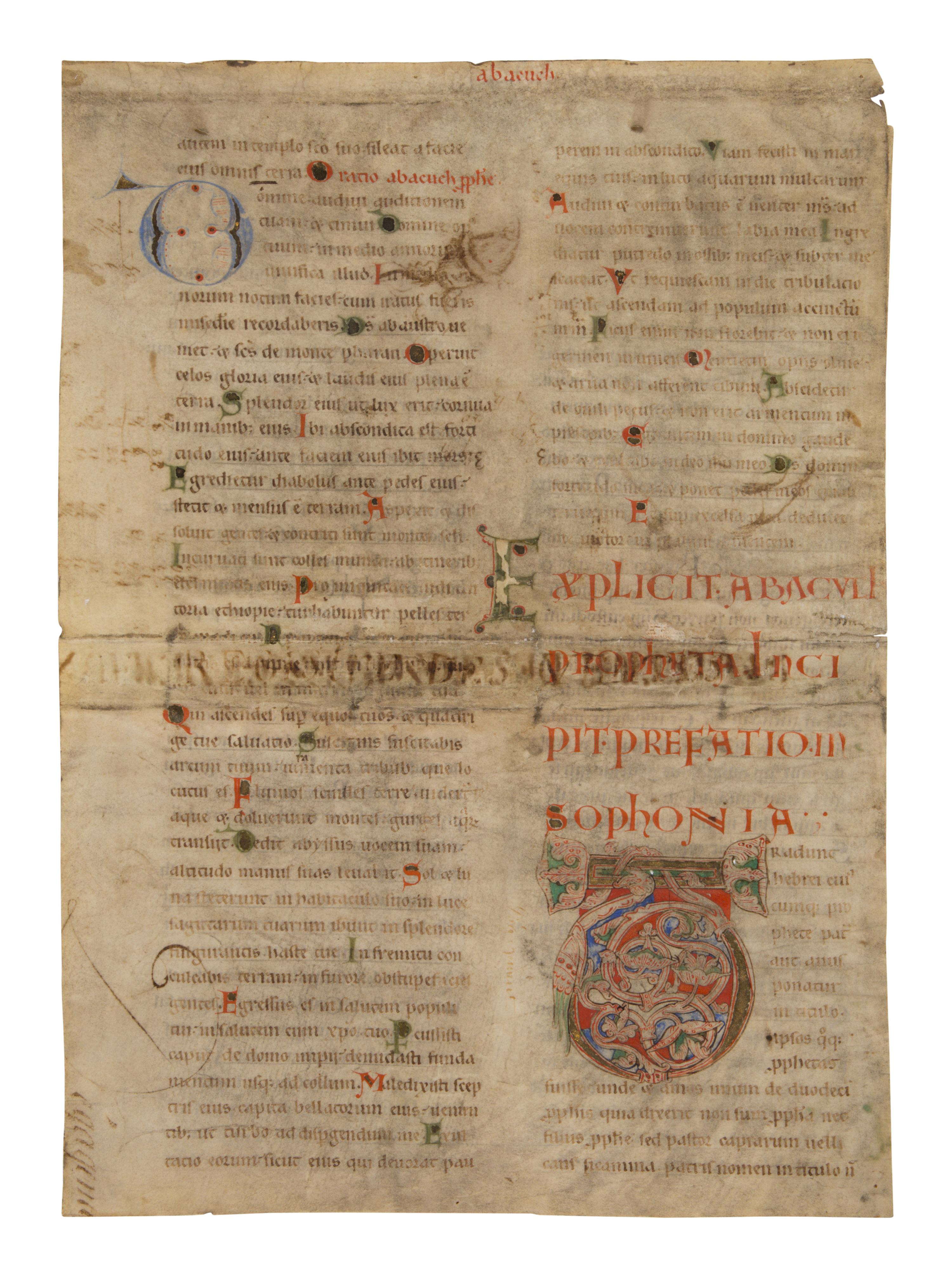 MOSAN ILLUMINATOR(?) Single leaf with decorated Initial ‘T’ from a Lectern Bible, in Latin, illuminated manuscript on parchment [The Netherlands, Mosan? c. 1150]