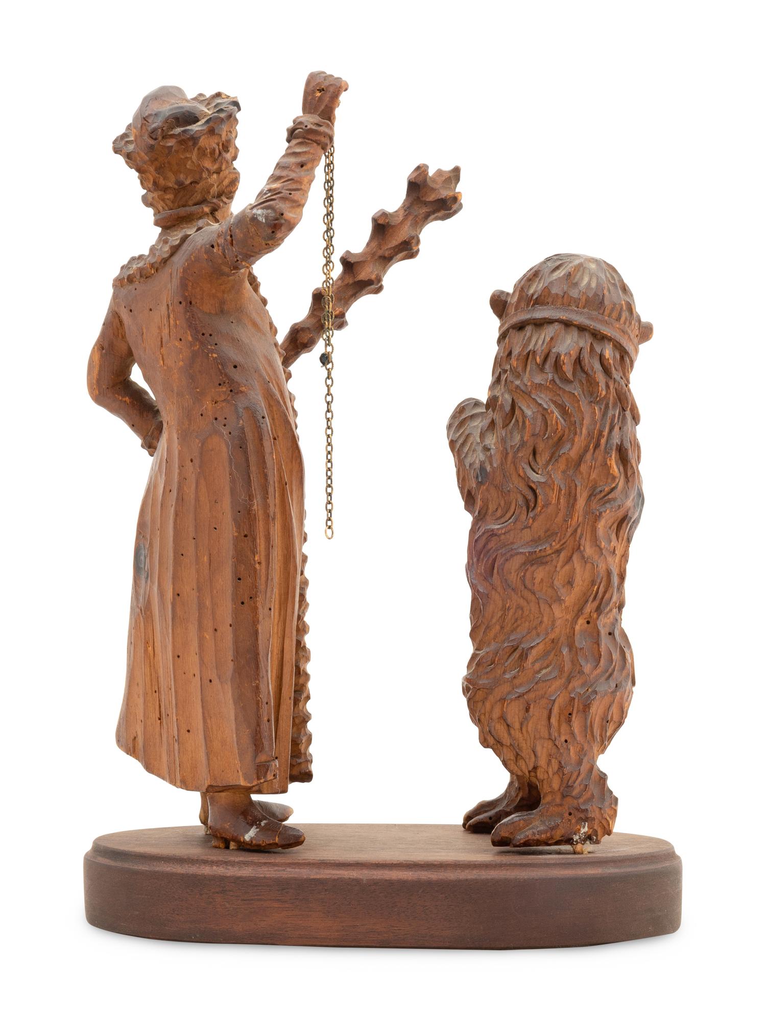 A Russian Carved Wood Figural Group