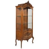 A Louis XV Style Carved Walnut Vitrine Cabinet