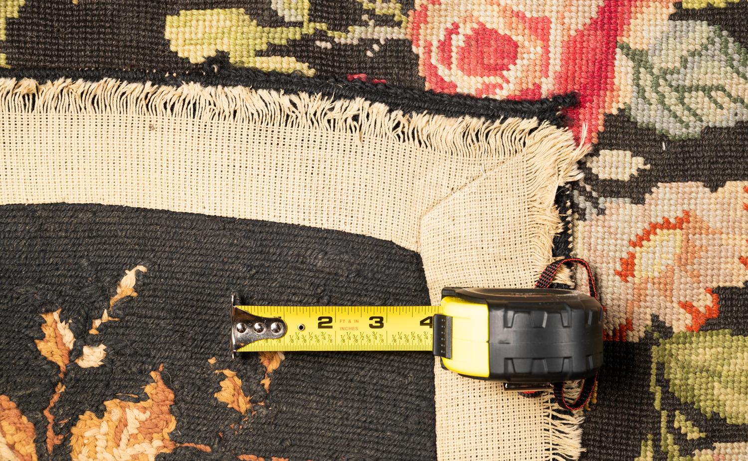 A Floral Needlepoint Rug