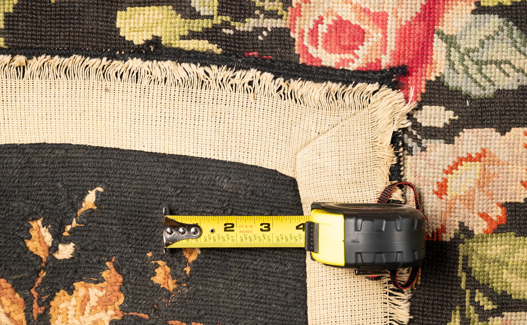 A Floral Needlepoint Rug