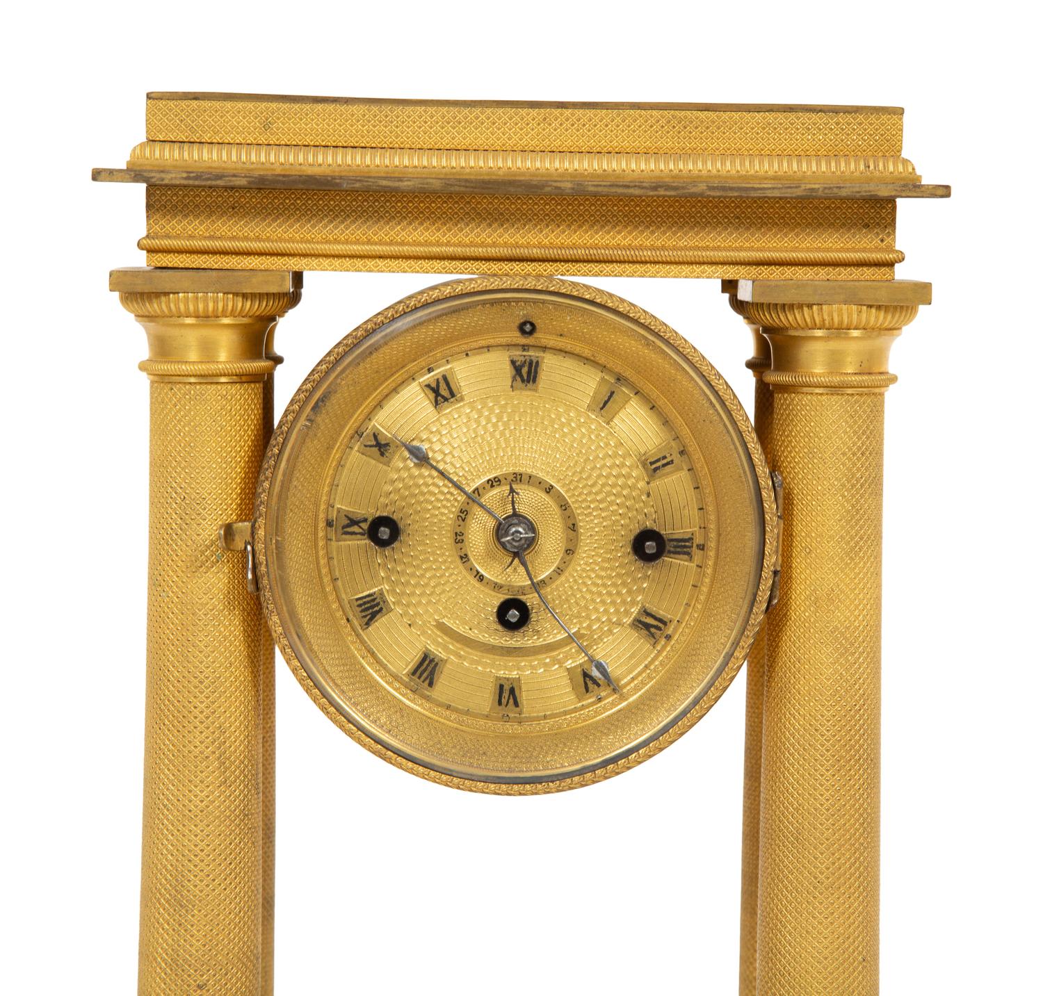 An Empire Style Gilt Bronze Portico Clock