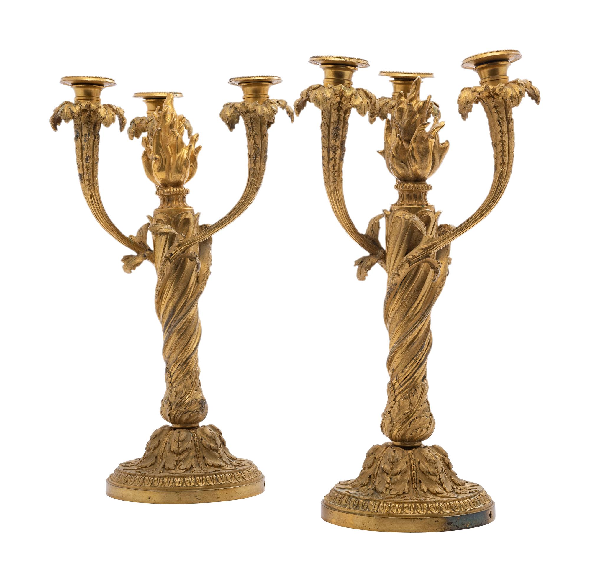 A Pair of French Gilt Bronze Candelabra