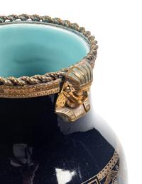 A Sarreguemines Cobalt Glazed Three-Piece Garniture with Egyptian Motif Mounts