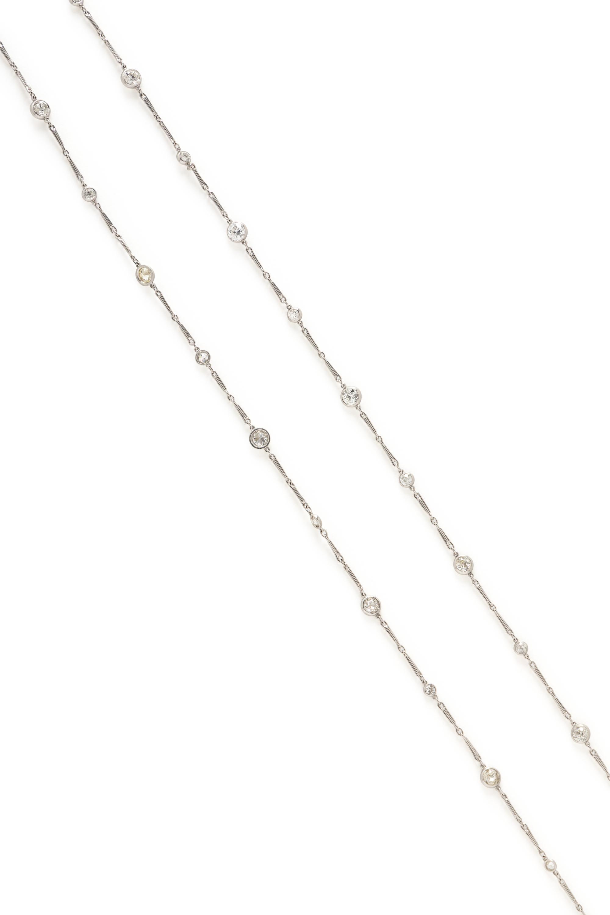 PLATINUM AND DIAMOND STATION CHAIN AND DIAMOND HEART PENDANT BROOCH