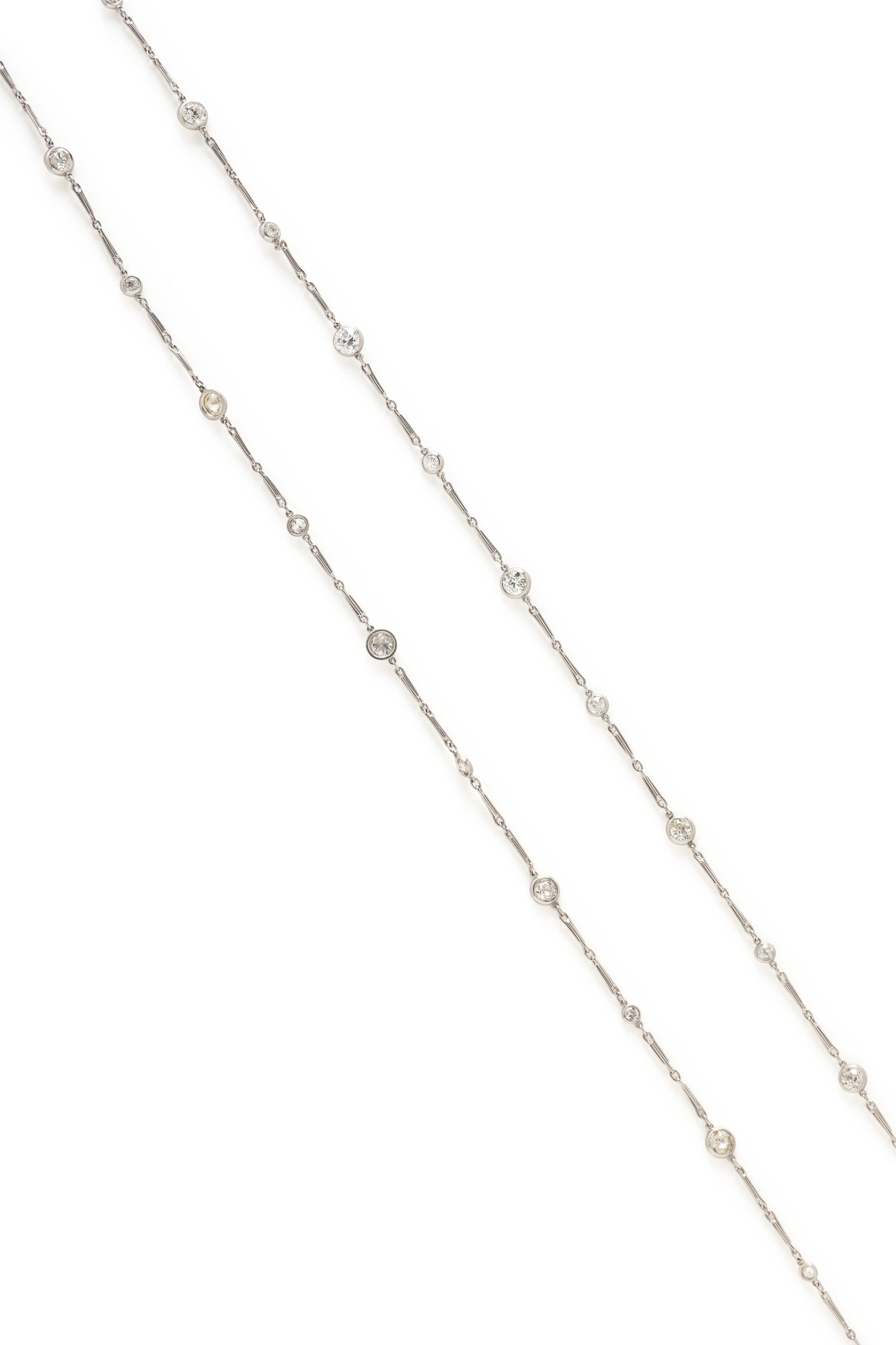 PLATINUM AND DIAMOND STATION CHAIN AND DIAMOND HEART PENDANT BROOCH