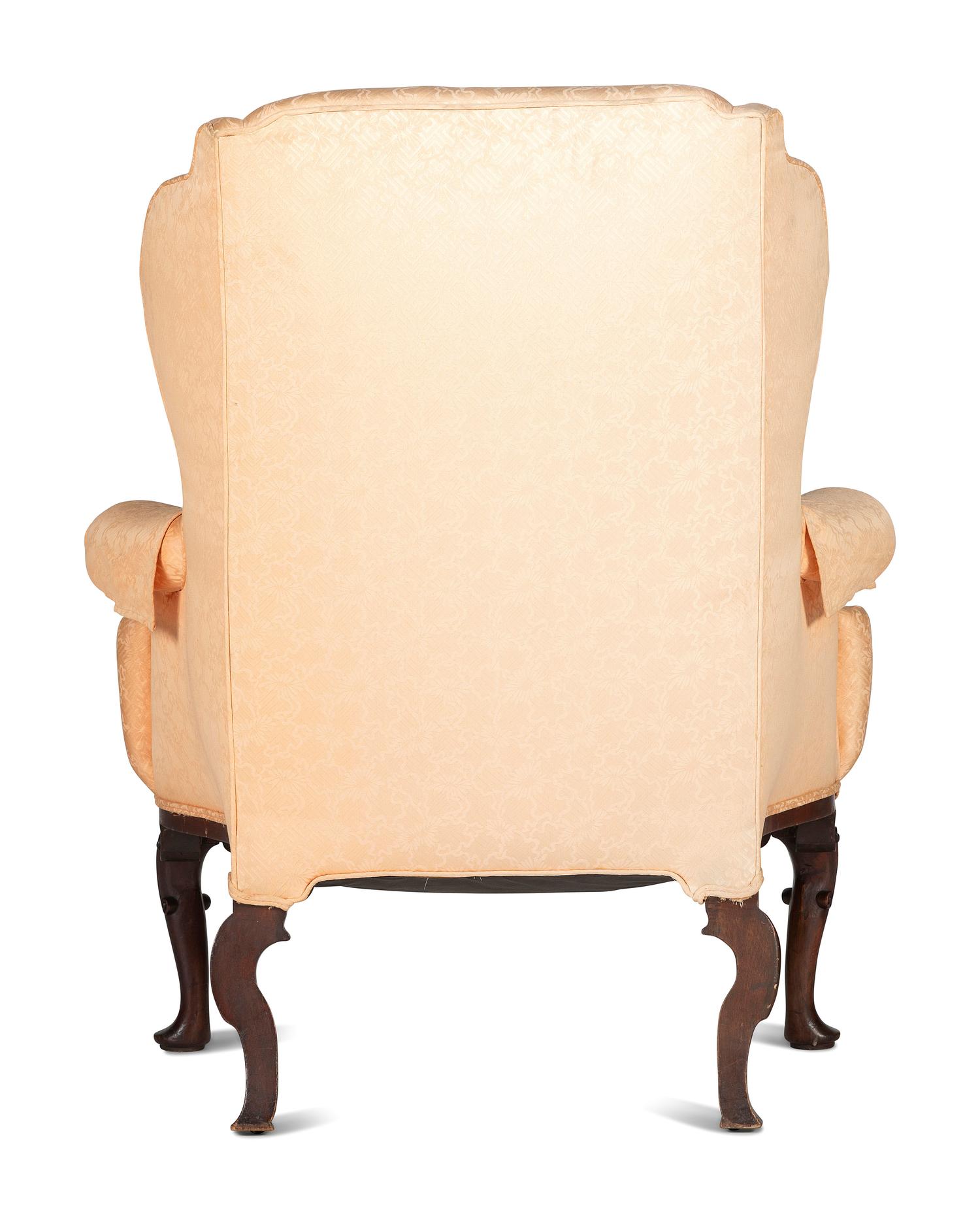 A Queen Anne Style Scroll-Carved Mahogany Easy Chair