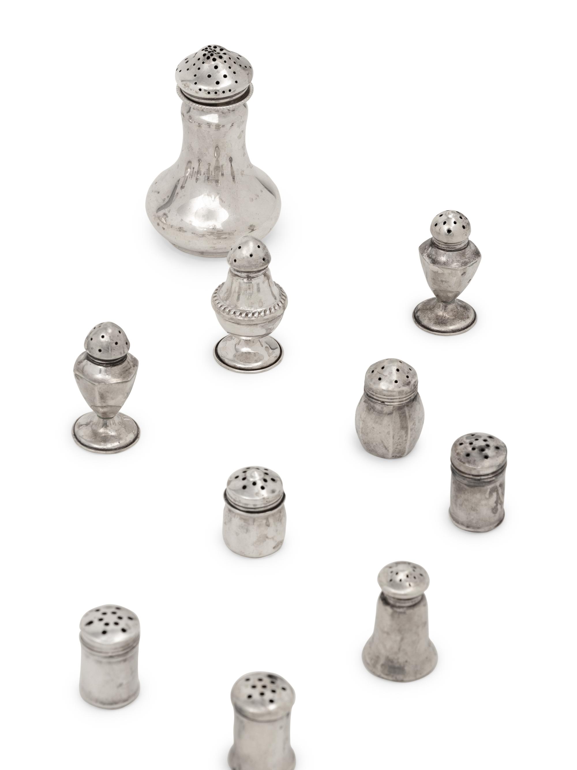 A Large Collection of Silver Casters