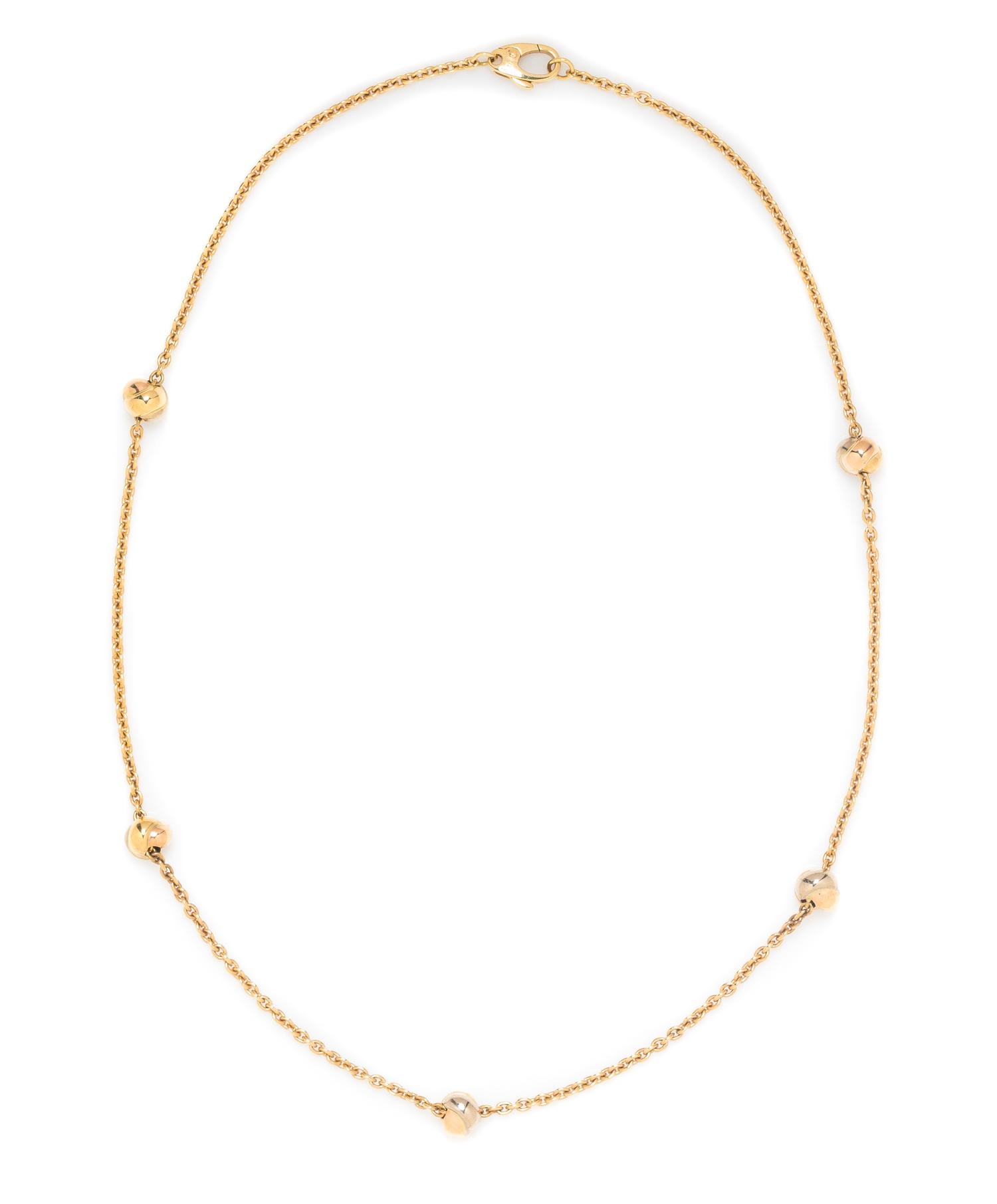 An 18 Karat Tricolor Gold "Trinity" Station Necklace, Cartier, 9.00 dwts.