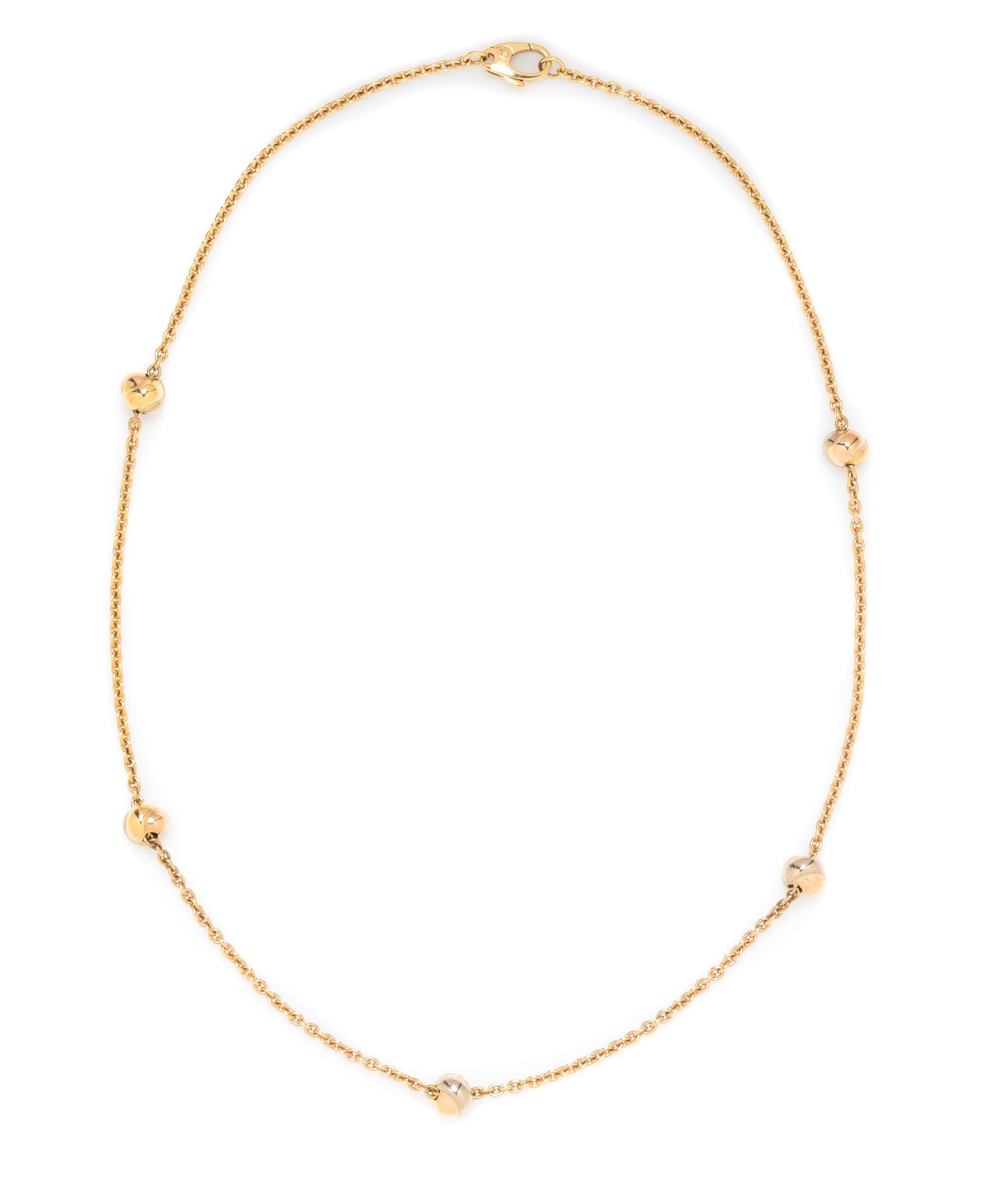 An 18 Karat Tricolor Gold "Trinity" Station Necklace, Cartier, 9.00 dwts.