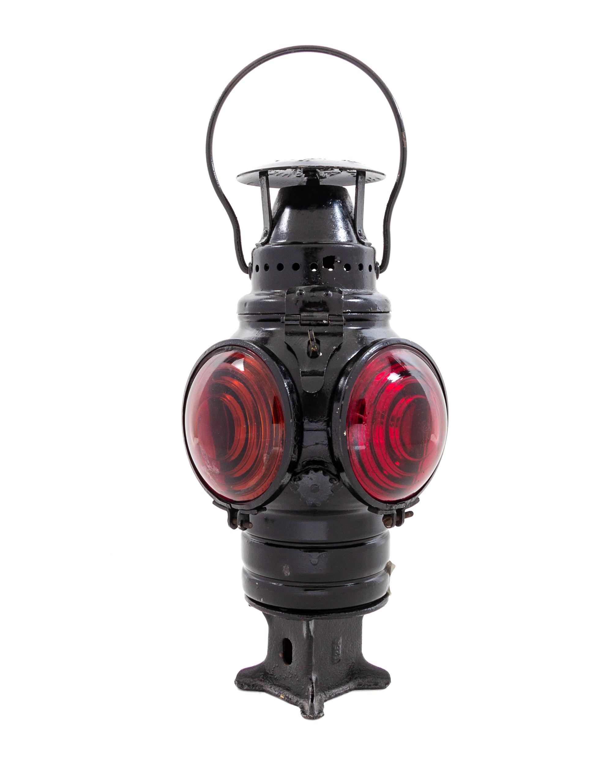 An Adlake Painted Metal Four-Light Railroad Lantern