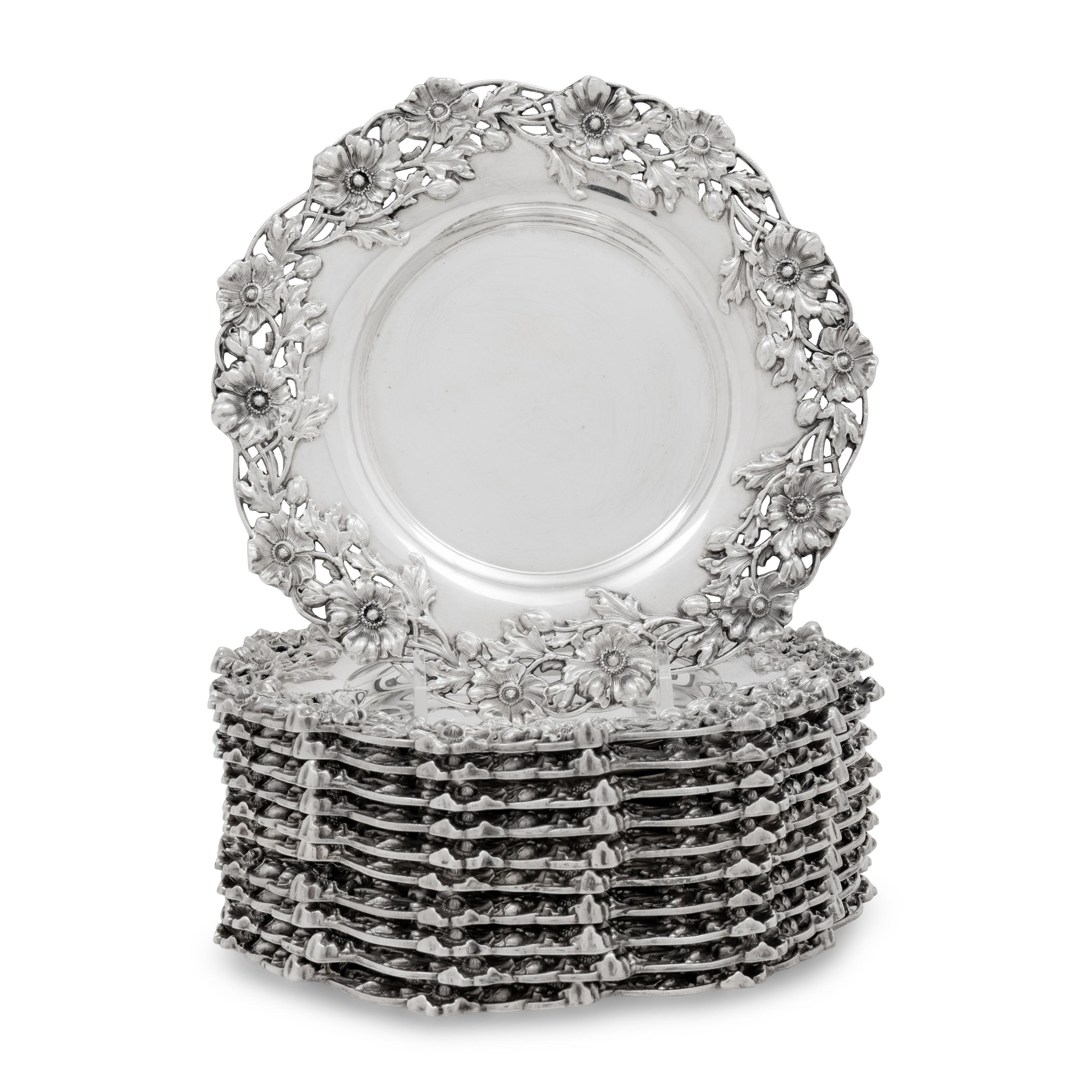 A Set of Eleven American Silver Bread Plates