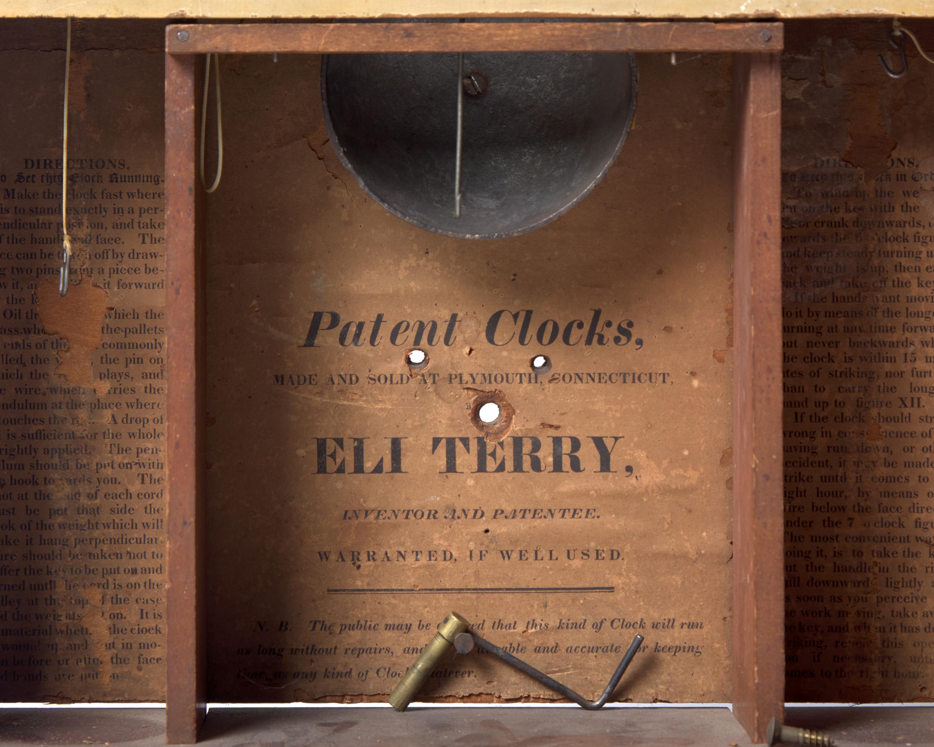 A Federal Inlaid Mahogany and Eglomise Shelf Clock
