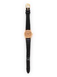 CORUM, 18K YELLOW GOLD US $5 COIN WRISTWATCH