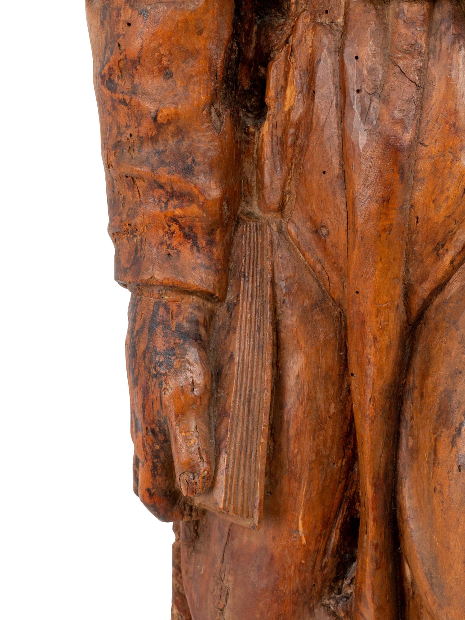 An Italian Carved Wood Figural Appliqué of a Saint