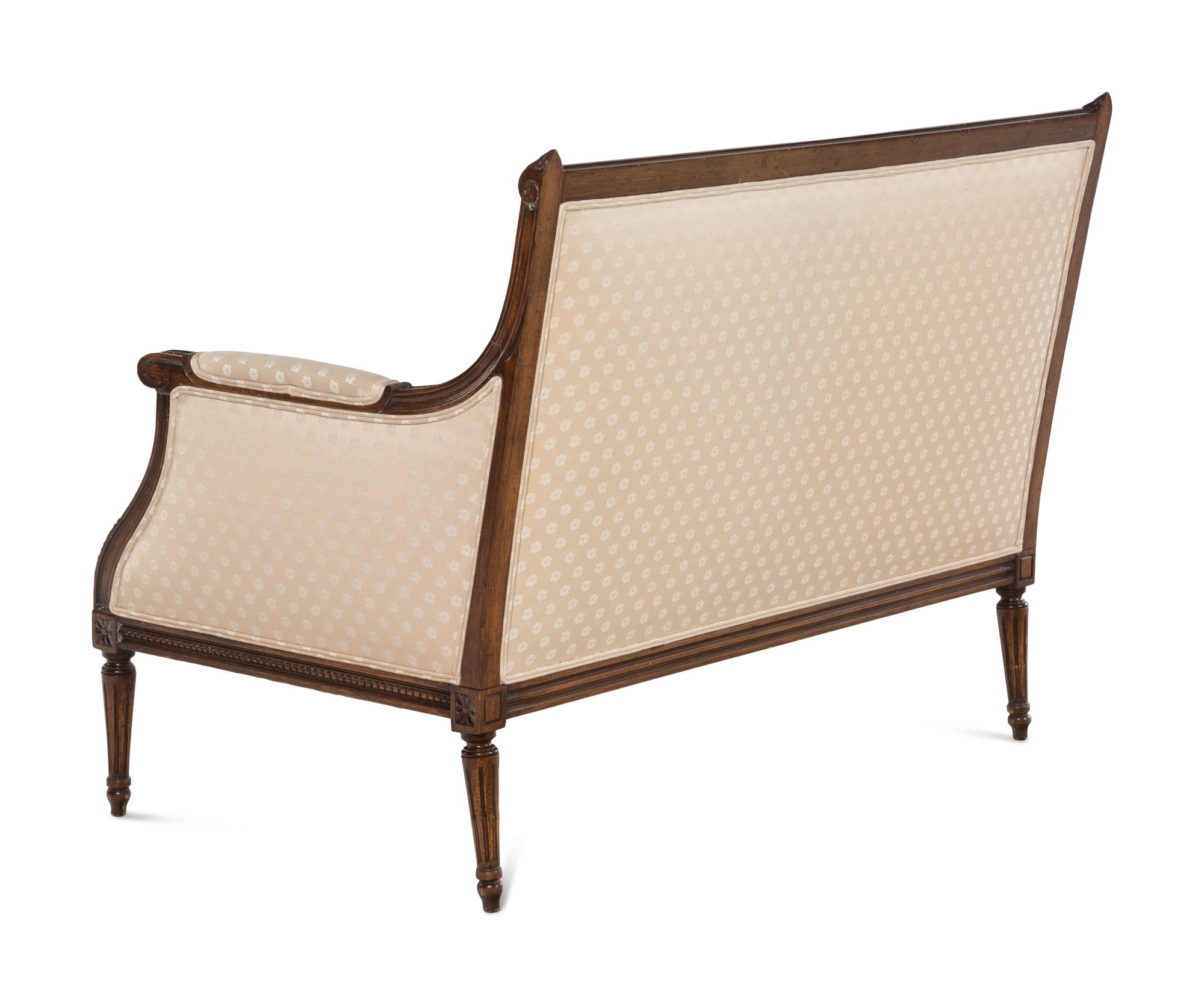 A Louis XVI Style Walnut Settee