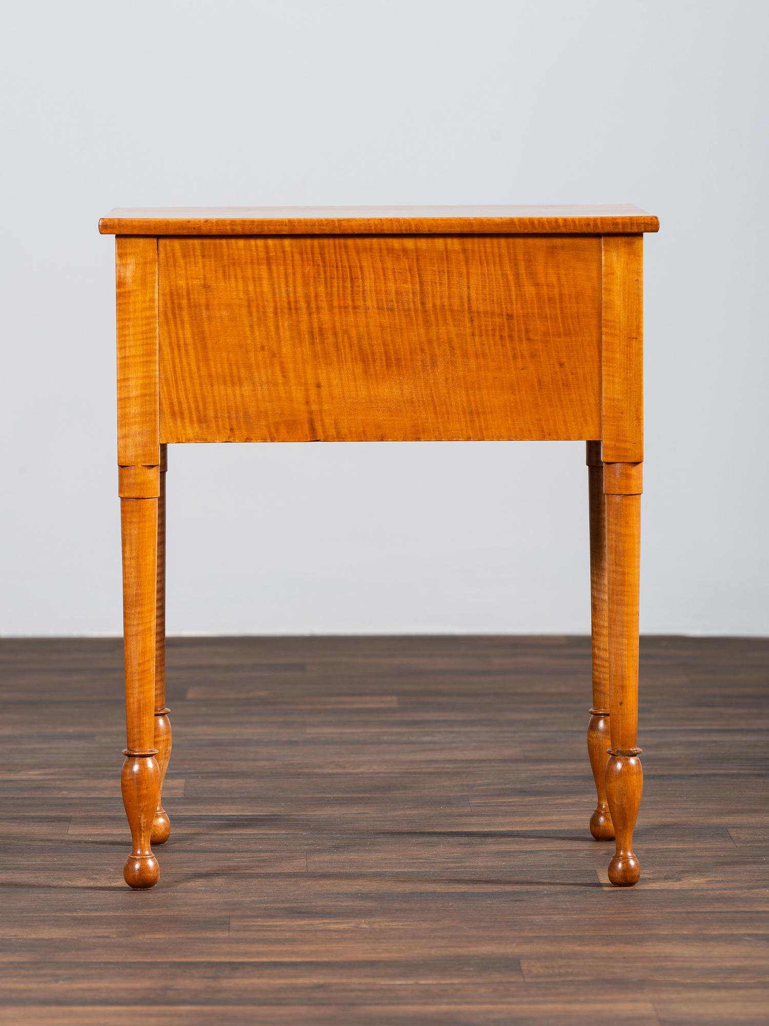 A Late Federal Tiger Maple Two-Drawer Work Table