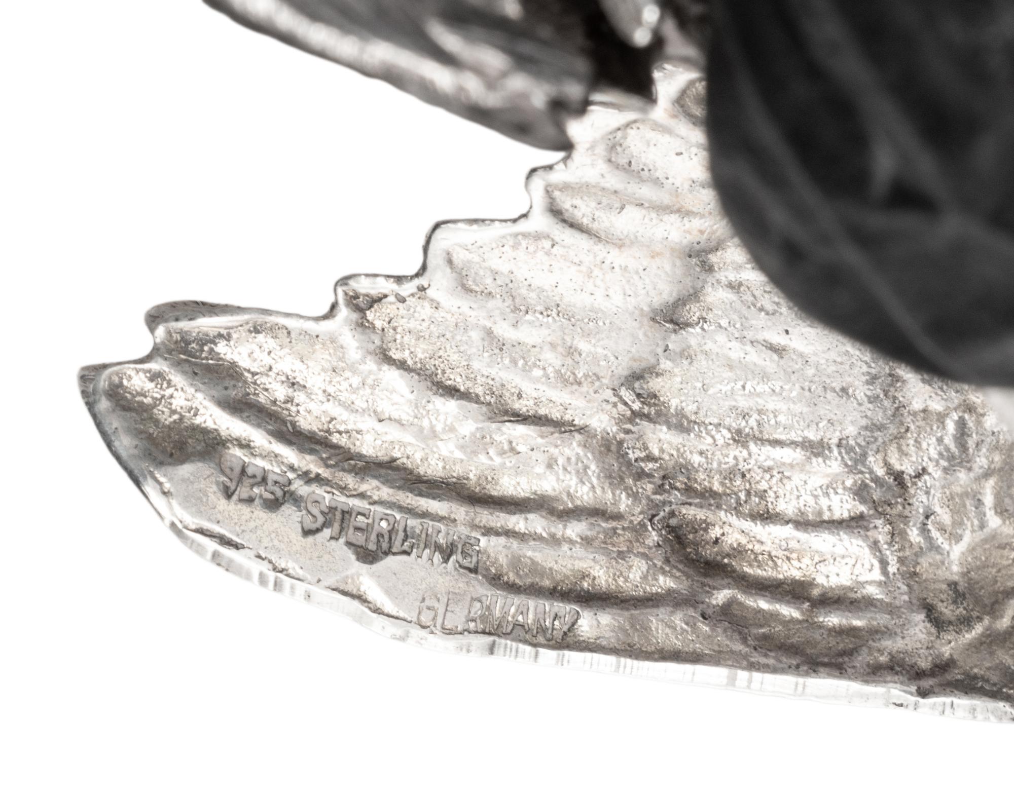 A Pair of Continental Silver Cockerels