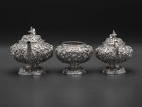 An American Repousse Silver Six-Piece Tea and Coffee Service