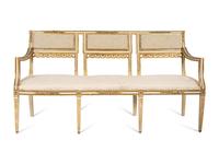 An Italian Louis XVI Style Cream Painted and Parcel Gilt Parlor Suite