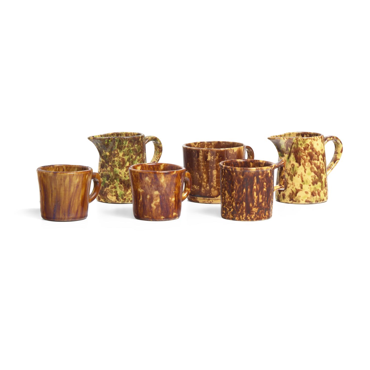 A Group of Fourteen Bennington or Rockingham Glazed Earthenware Items
