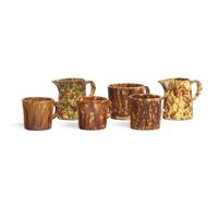 A Group of Fourteen Bennington or Rockingham Glazed Earthenware Items