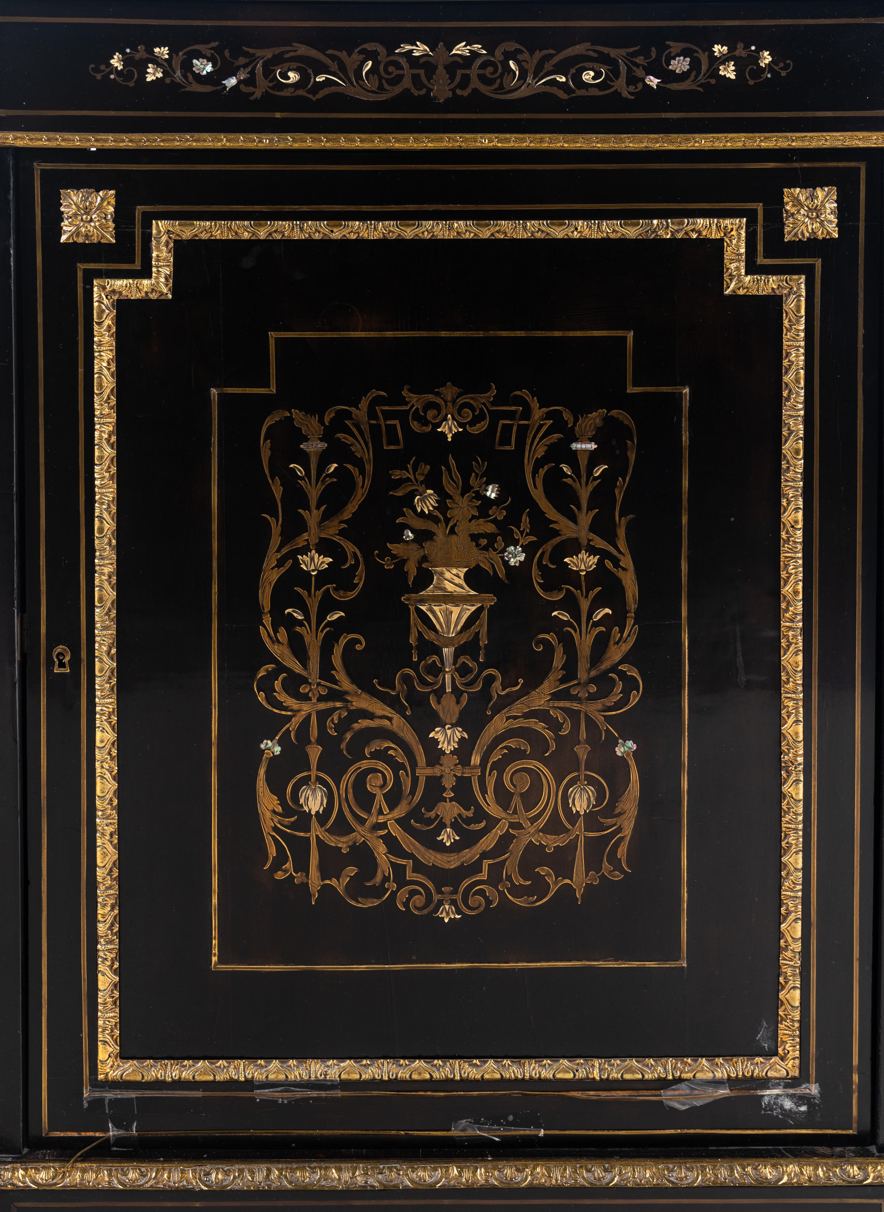 A Napoleon III Brass and Pewter Inlaid Ebonized Marble-Top Cabinet