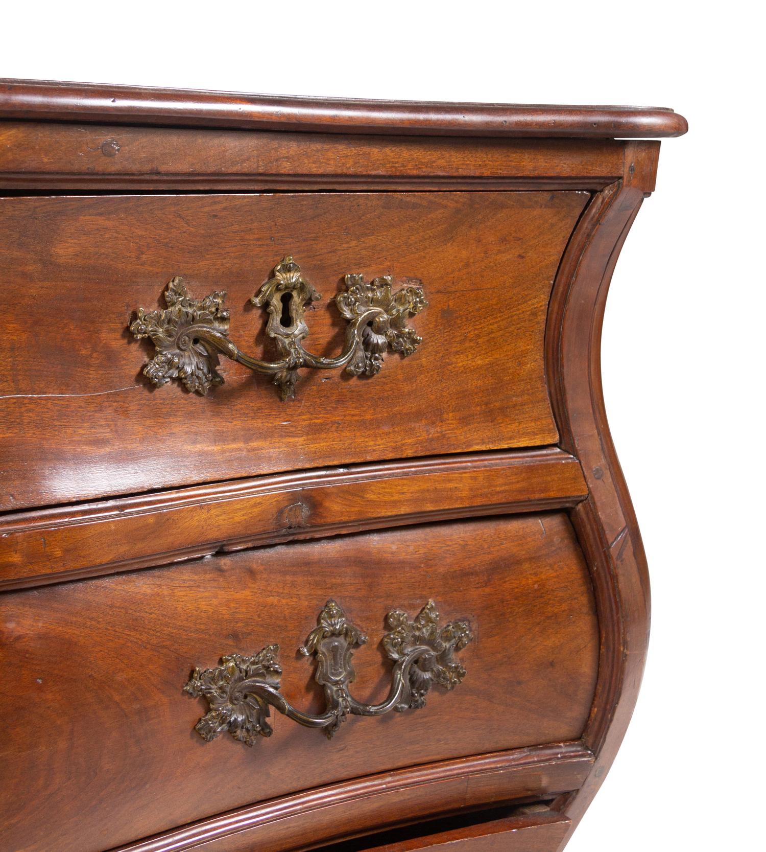 A Louis XV Provincial Walnut Bombé Commode