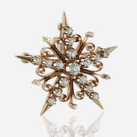 A Yellow Gold and Diamond Pinwheel Necklace