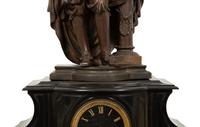 A French Black Marble and Cast Metal Figural Mantel Clock