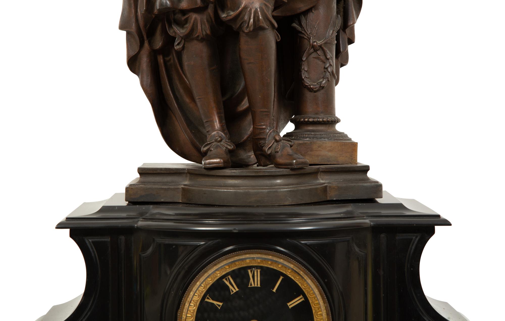 A French Black Marble and Cast Metal Figural Mantel Clock