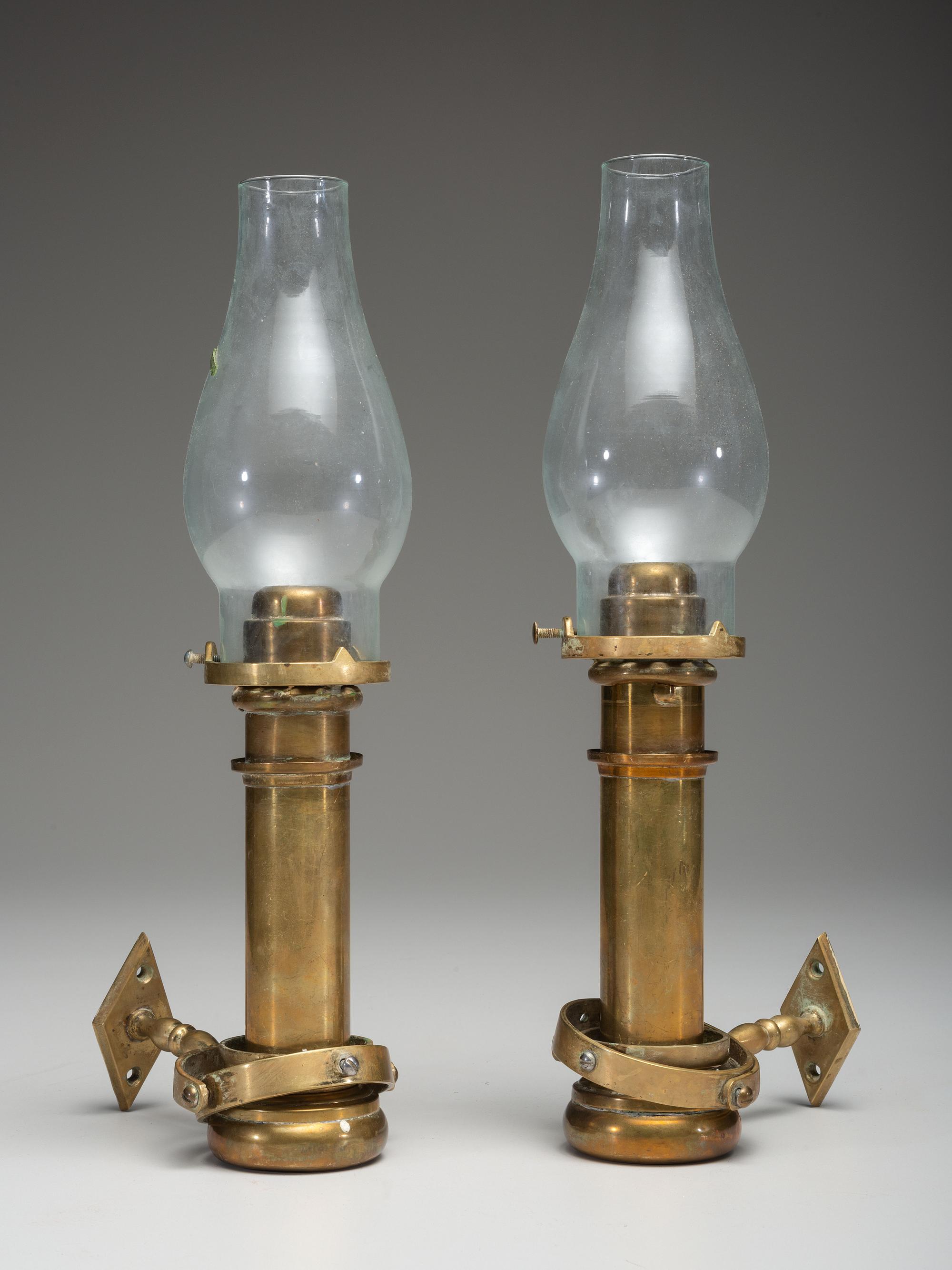 A Pair of Brass Gimballed Ship's Wall Oil Lamps with Hurricane Shades