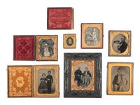 [EARLY PHOTOGRAPHY]. 14 cased images of varying subjects, incl. daguerreotypes of confident gents.