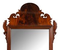 A Chippendale Carved and Figured Walnut Looking Glass