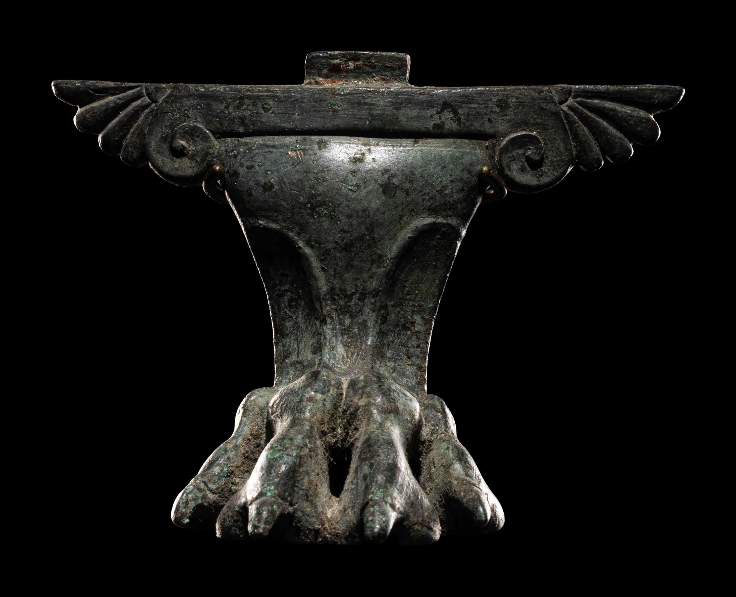A Greco-Roman Bronze Winged Cista Foot