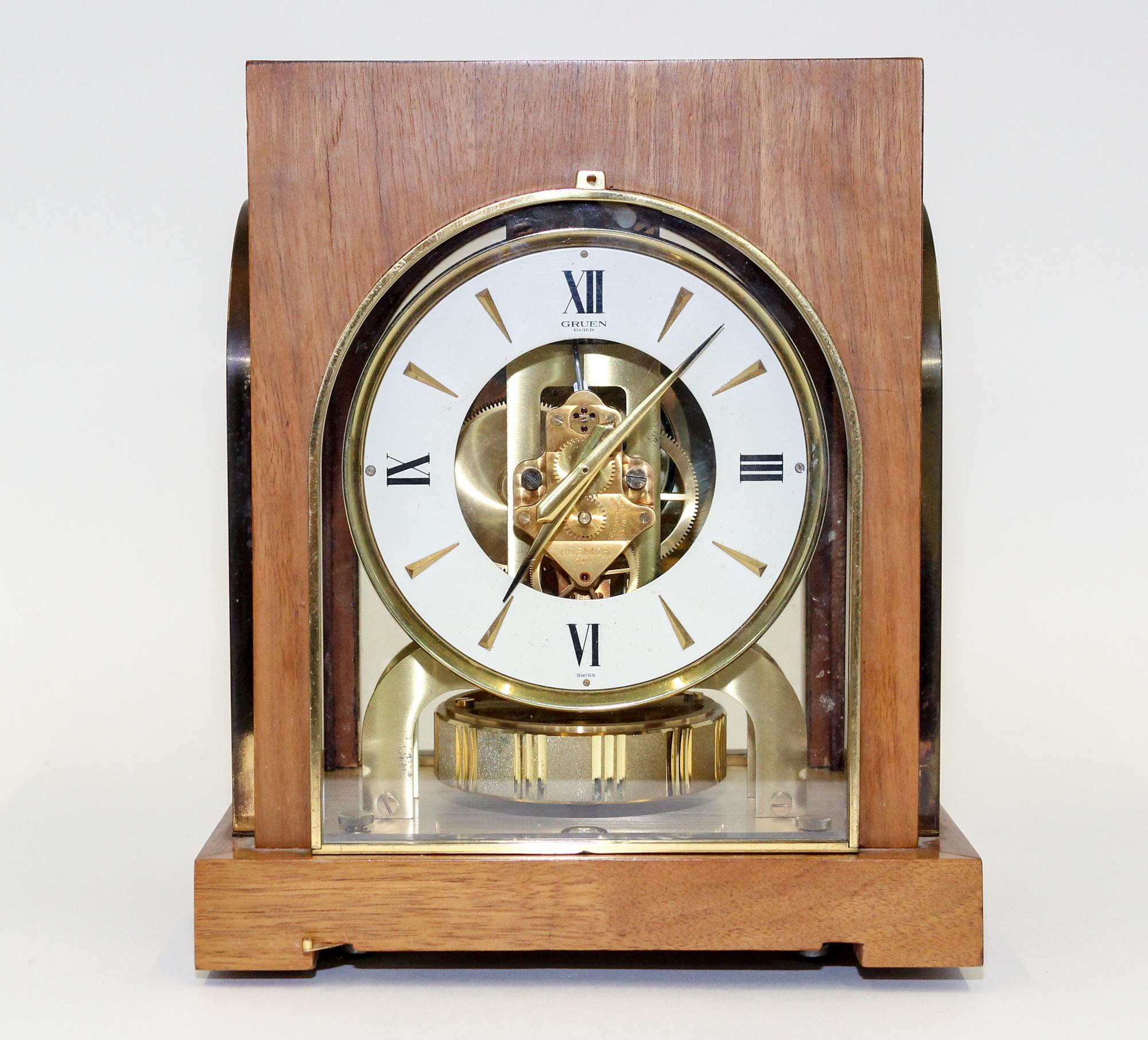 A Jaeger-LeCoultre for Gruen Atmos Clock Height 10 1/4 x width 8 3/8 x depth 6 5/8 inches.