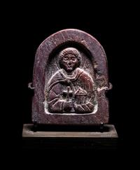 A Byzantine Red Steatite Icon of Saint Panteleimon