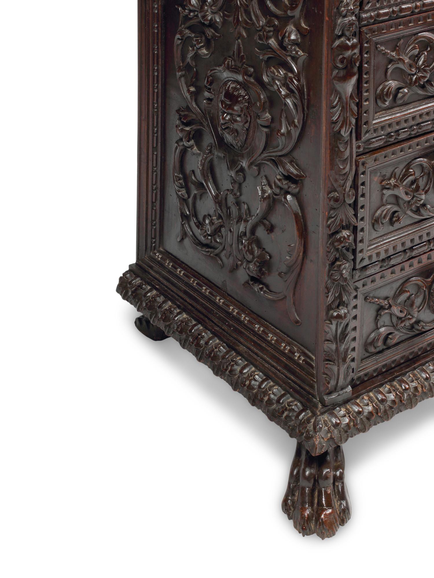 An Italian Renaissance Style Mahogany Chest of Drawers